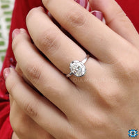 Handmade bezel engagement ring with an elegant design.
