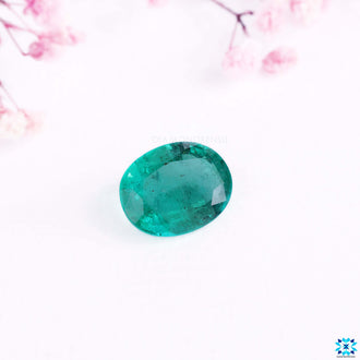 Oval gemstone featuring green emerald gemstone shade.
