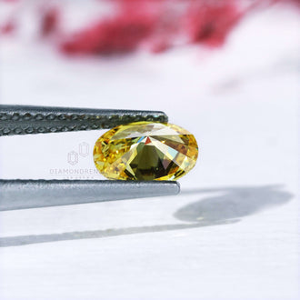 IGI certified loose oval yellow diamond lab grown.
