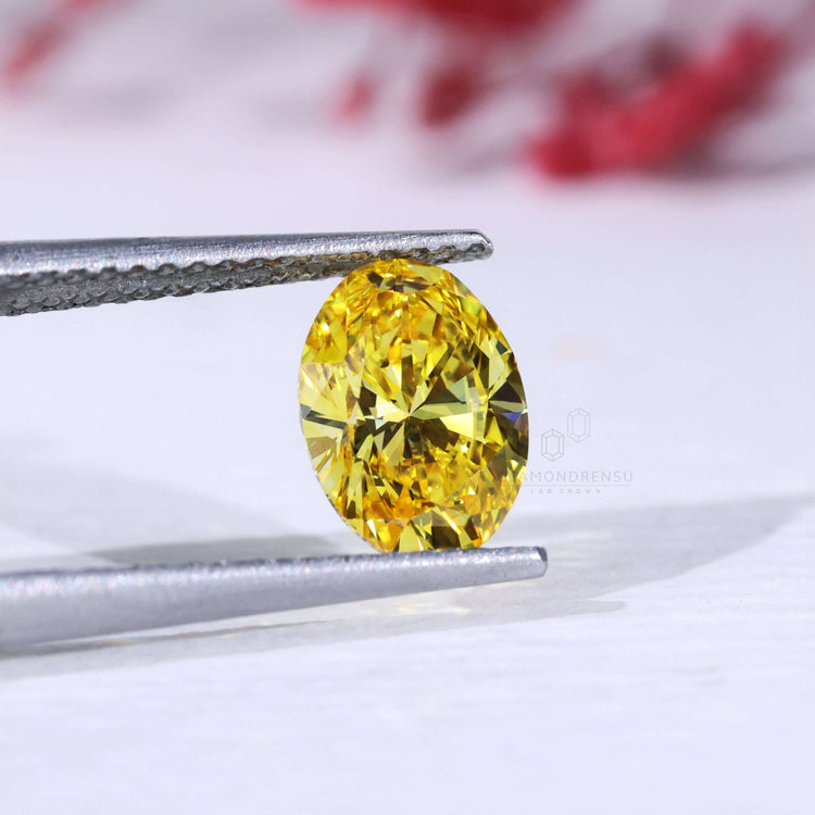 IGI certified yellow oval diamond loose stone.
