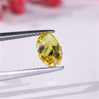 Lab grown yellow diamond oval shaped 1 carat.
