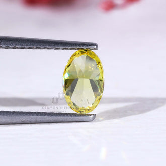 Loose lab grown diamond yellow oval cut 0.60 carat.

