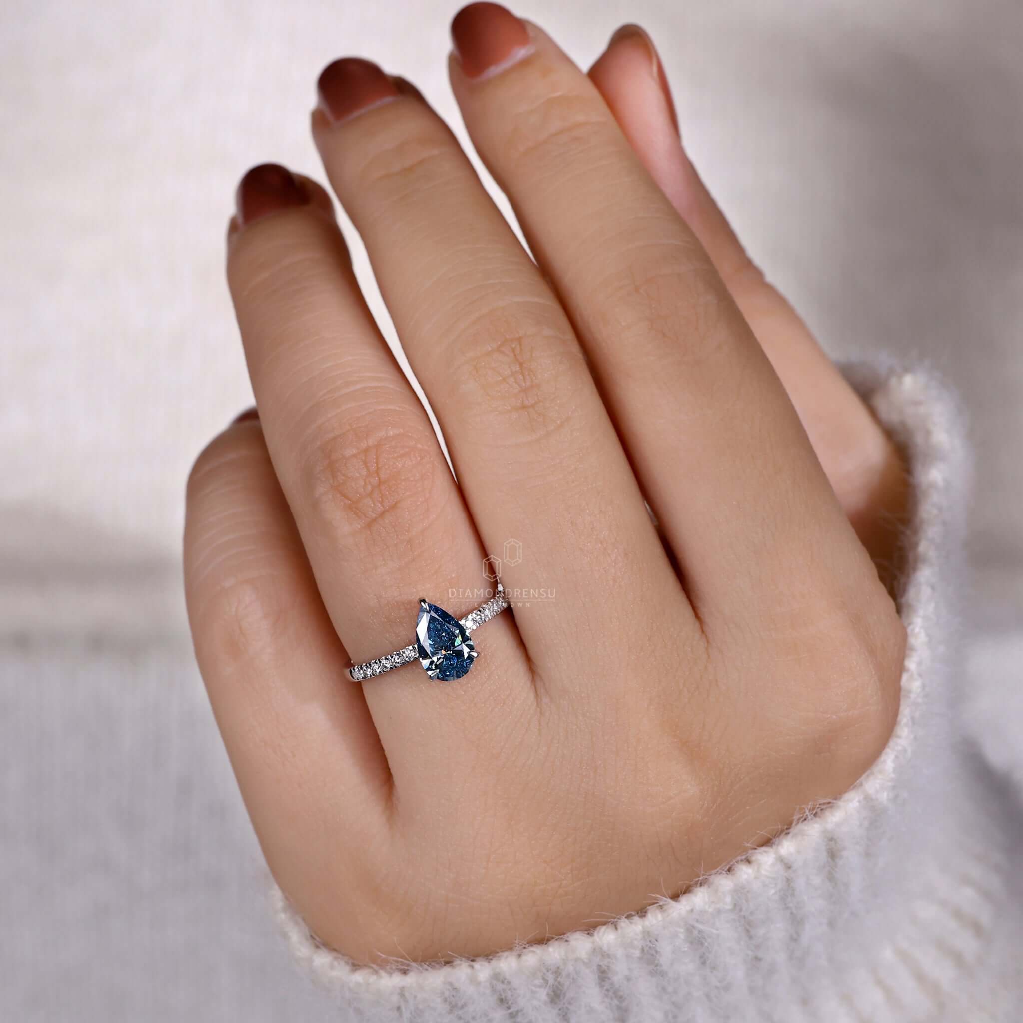 blue pear engagement ring