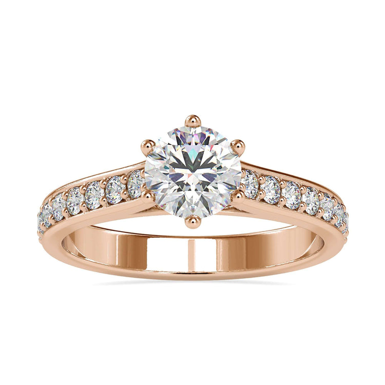 Round diamond ring in a channel setting, rose gold design