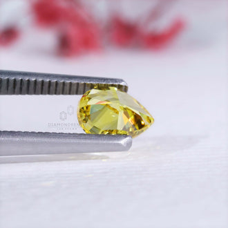 IGI certified lab grown diamonds loose stones include this yellow pear cut.
