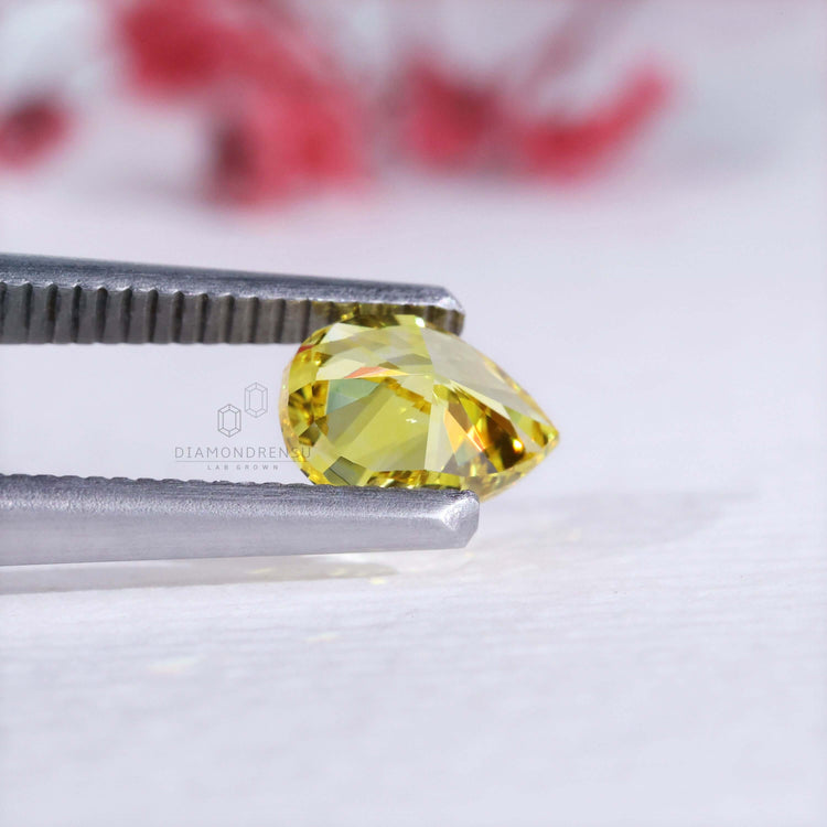 IGI certified lab grown diamonds loose stones include this yellow pear cut.
