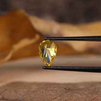 Loose diamond pear shape yellow lab grown.
