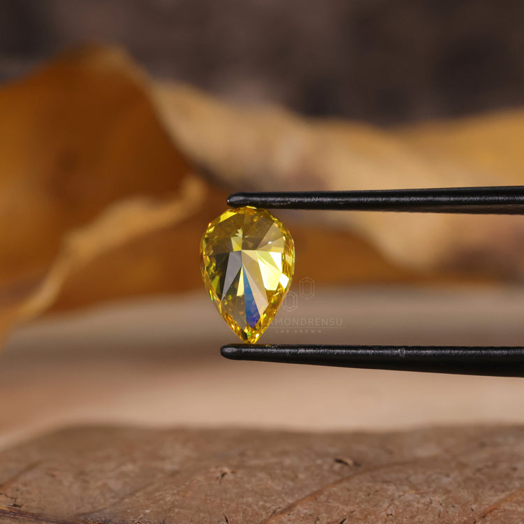 Loose diamond pear shape yellow lab grown.
