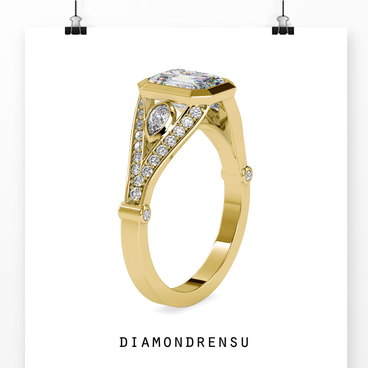 Engagement ring with pave and emerald cut diamond in a handmade design
