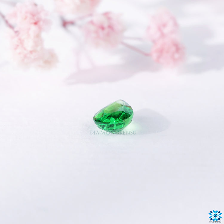 Pear cut gemstone listed as birthstone for January in green gemstone category.
