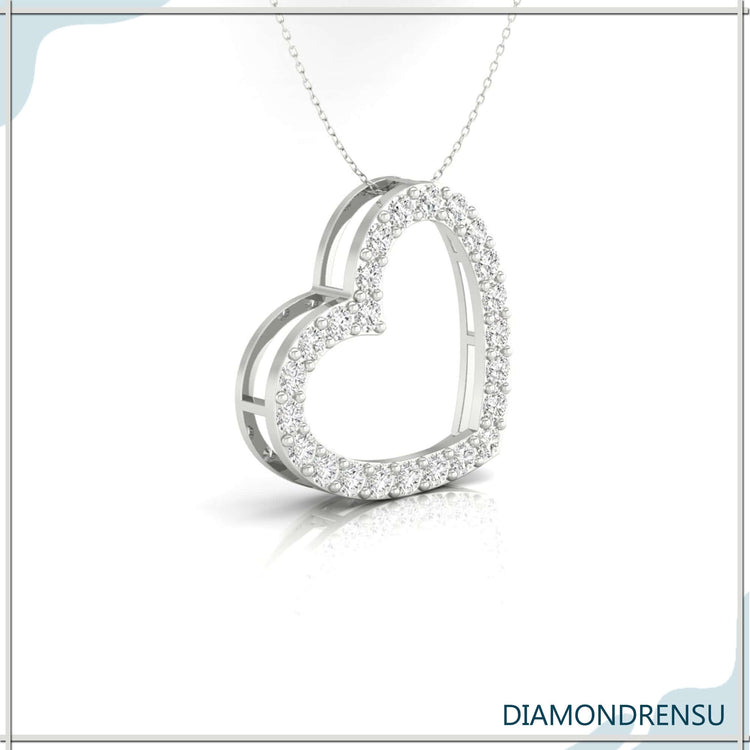 The heart outline pendant necklace adds a delicate, modern touch.
