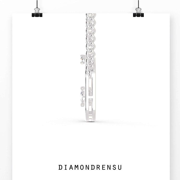 The center diamond adds elegance and focus to the pendant.
