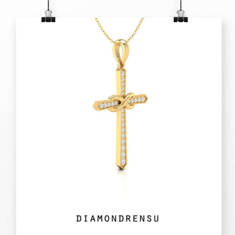 This gold cross pendant shines with elegance and warmth.
