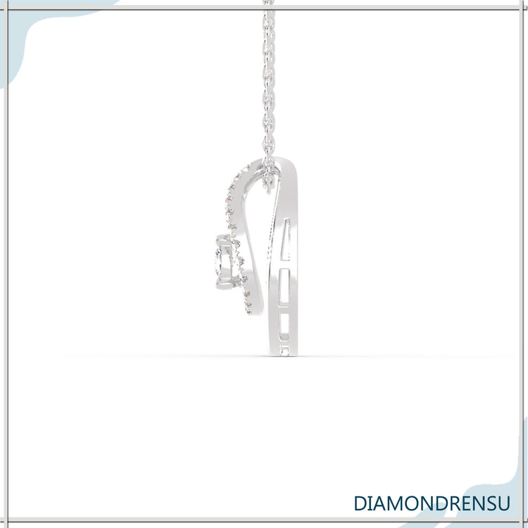 A small pendant with chain adds a delicate, simple touch.
