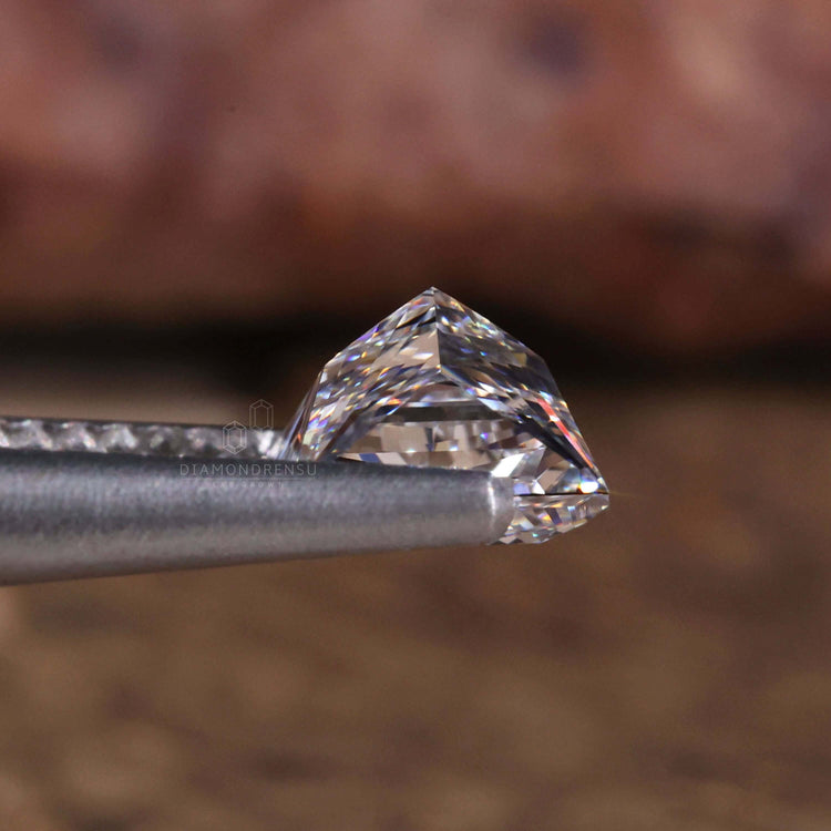 1.5 carat princess cut diamond and loose lab diamond.
