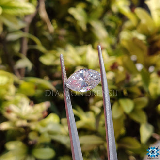 Moissanite stone shaped as Moval Cut Moissanite featured in custom necklace settings.