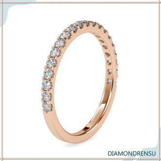 Shared prong engagement ring with a matching diamond pave band
