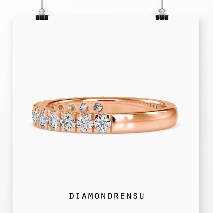 Wedding band for women crafted with a half diamond wedding band style.
