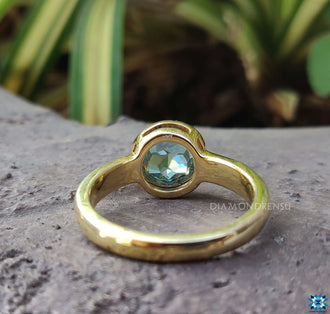 Solitaire round engagement ring designed for modern brides.