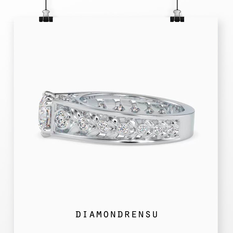 Round engagement ring featuring a peekaboo diamond design.
