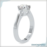 Round solitaire ring with a classic basket setting.