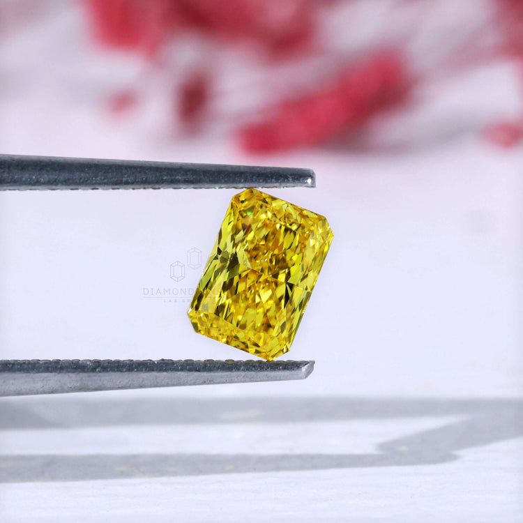 Certified loose radiant cut yellow lab grown diamond.
