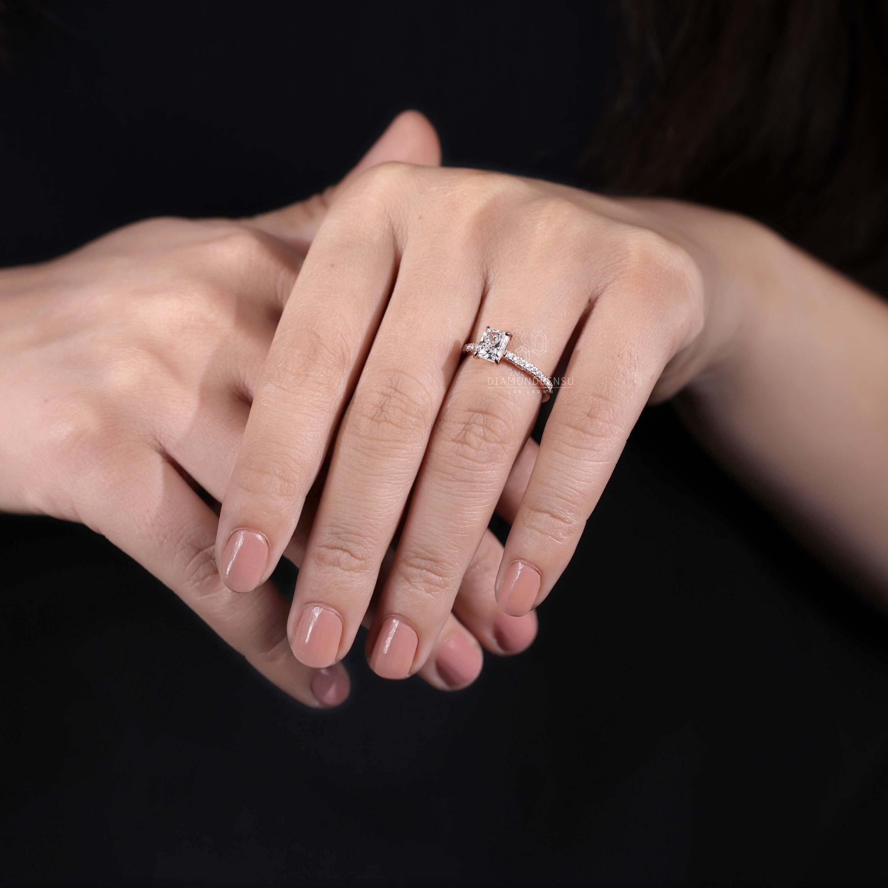 1 carat diamond ring on hand
