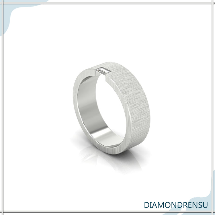 Baguette cut diamond ring in a modern brushed finish design.
