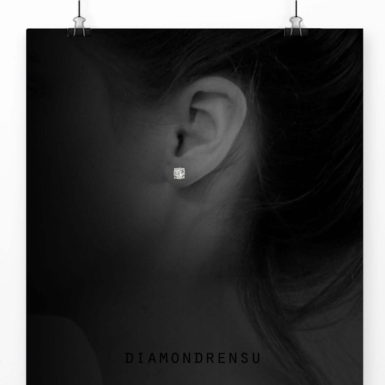 Stunning cushion cut diamond earrings featuring Lab Grown Diamond, IGI certified for sustainability.
