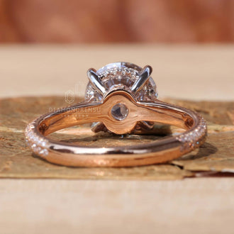 Two tone white and rose gold 3 sided pave diamond ring.
