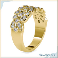 Half eternity wedding band with a brilliant cut diamond in a bezel setting.
