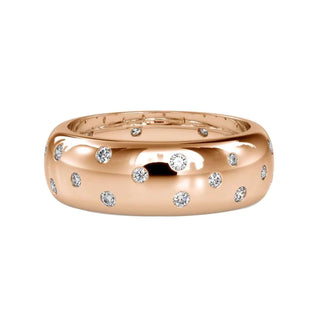 Flush setting round diamond wedding band in rose gold
