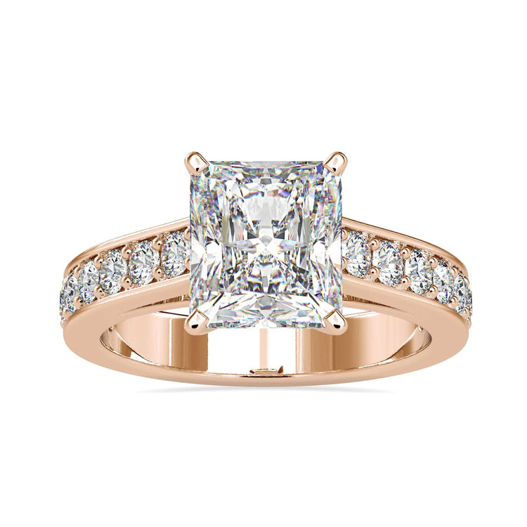 An engagement ring with pave accents and a prong setting ring style for ultimate brilliance.
