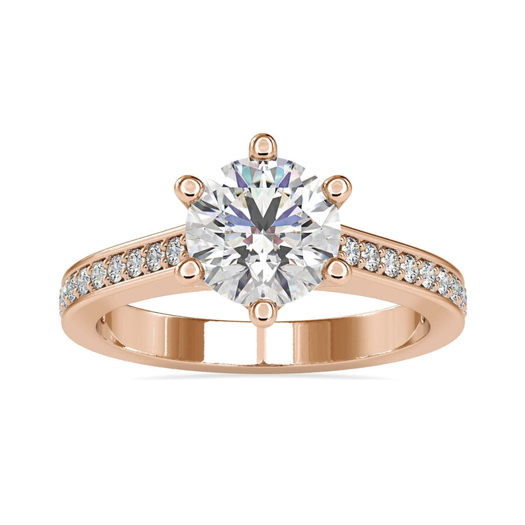 Round diamond ring with a pave ring setting and a six prong diamond setting for extra security.