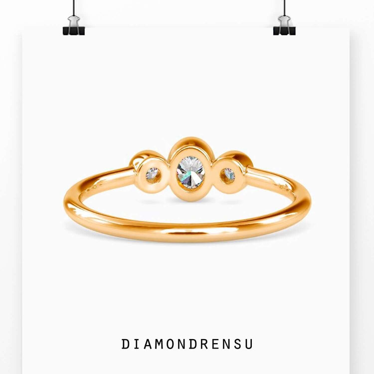 Oval engagement ring in yellow gold with IGI certified lab grown diamond
