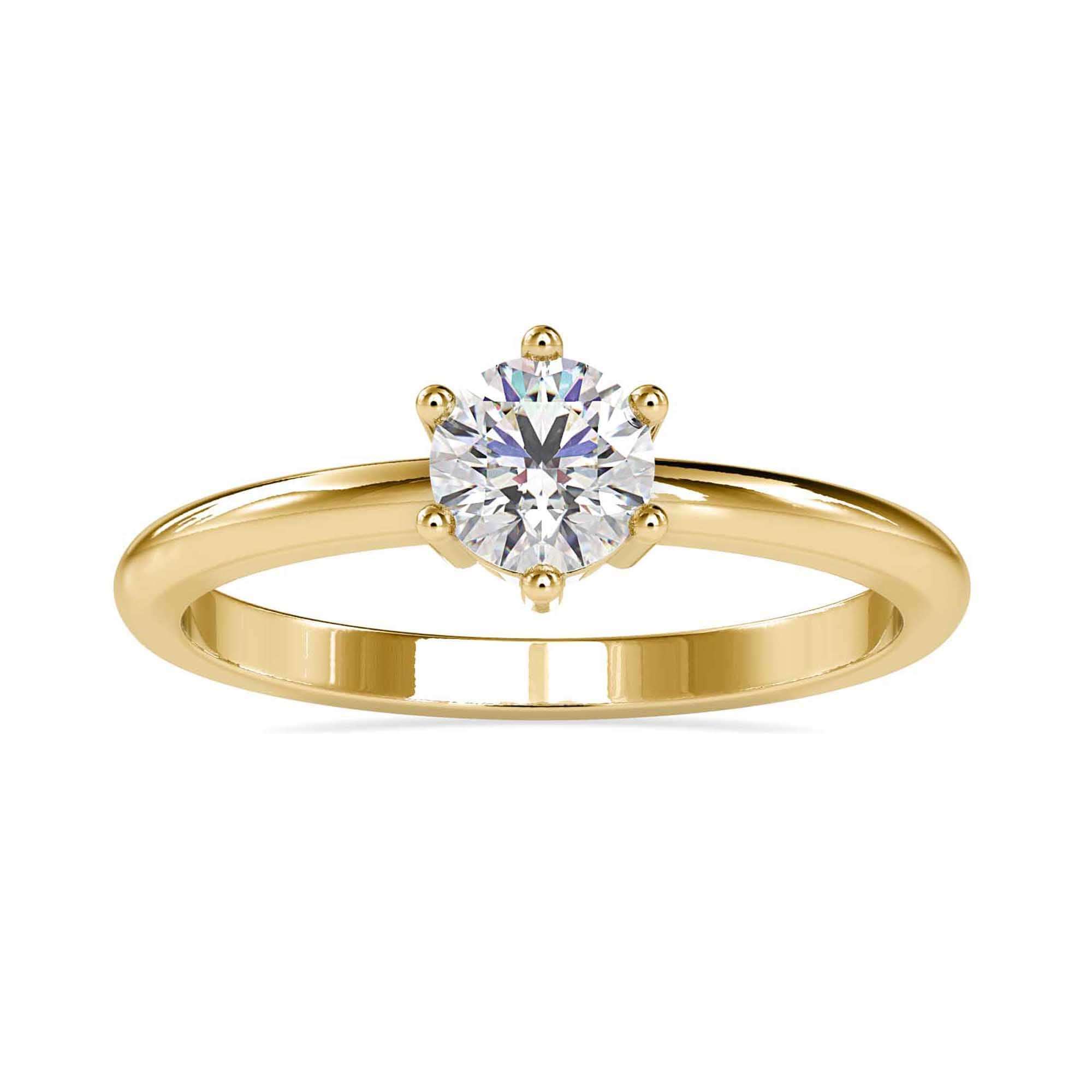 Simple diamond solitaire ring with a secure six prong setting in white gold.