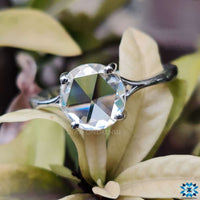 4 prong engagement ring designed to enhance natural brilliance.
