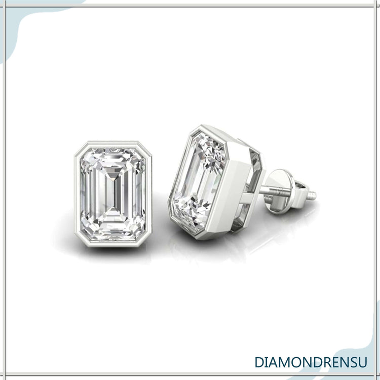 Exquisite bezel diamond studs in a gold bezel setting, ideal for formal wear.
