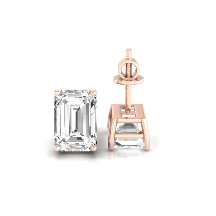 Exquisite emerald cut emerald stud earrings with diamonds, perfect for everyday elegance.