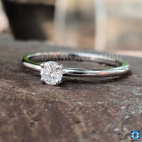Beautiful solitaire cut engagement ring with a sleek finish.
