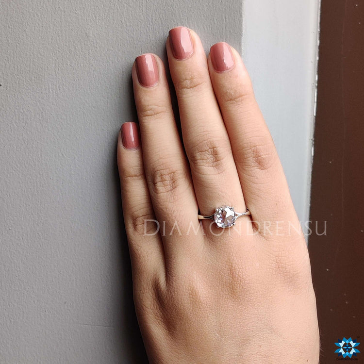 Rose cut moissanite crafted for a sparkling and radiant look.