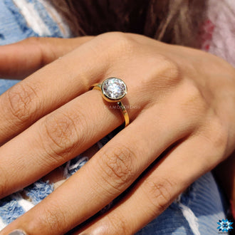 Eye-catching bezel set engagement ring for your special moment.
