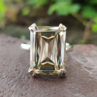 A stunning gold solitaire engagement ring featuring a timeless design and elegant craftsmanship.