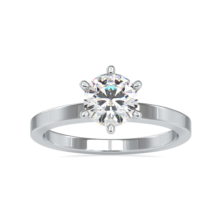 Solitaire wedding ring featuring a round diamond ring with a six prong setting and handmade jewelry.