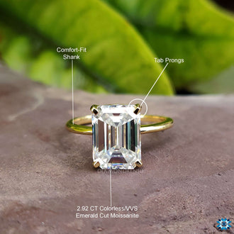Stunning moissanite solitaire engagement ring​ that highlights the beauty of the emerald cut.
