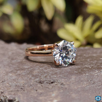 4 prong solitaire engagement ring designed for secure and stylish wear.
