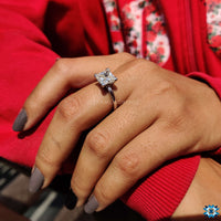A beautiful 2 ct princess cut engagement ring set in a white gold V prong setting marquise design.