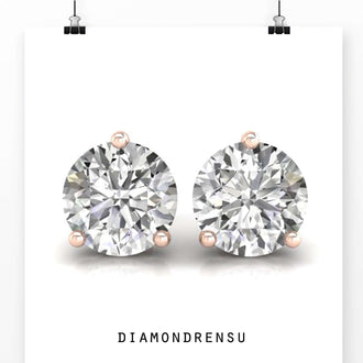 Elegant round gold earrings studs with a handmade finish, ideal for special occasions.
