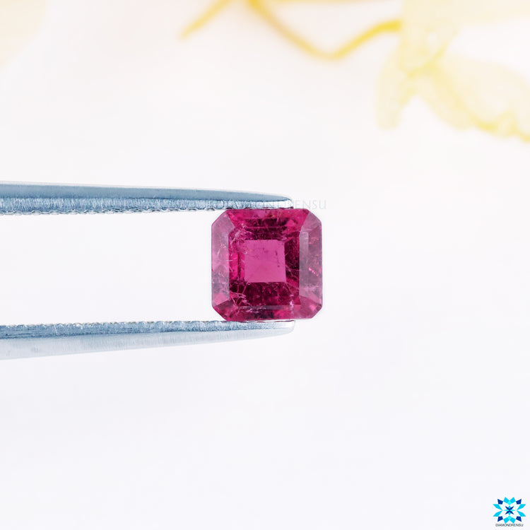 Loose asscher cut gemstone pink tourmaline.
