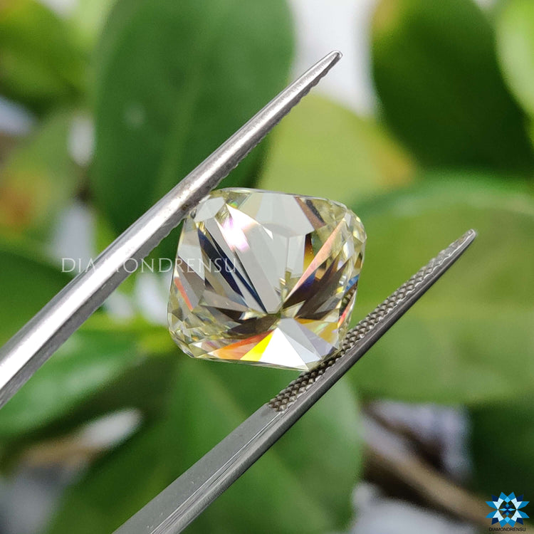 Light Yellow Cushion Cut Moissanite featured in bridal ring settings from Diamondrensu.